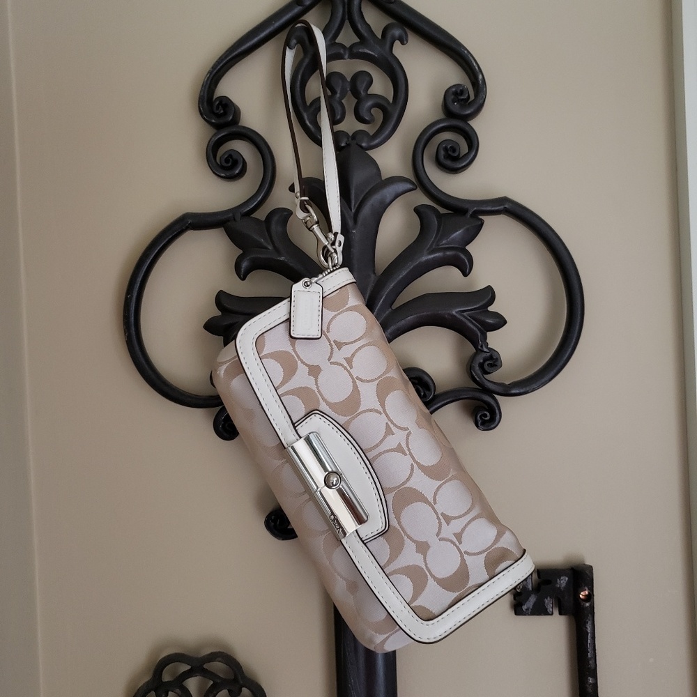 Tan/Cream Leather Coach Bag .